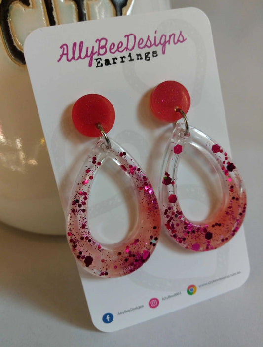 Pink sparkle resin stud dangle earrings